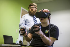 student with VR headset