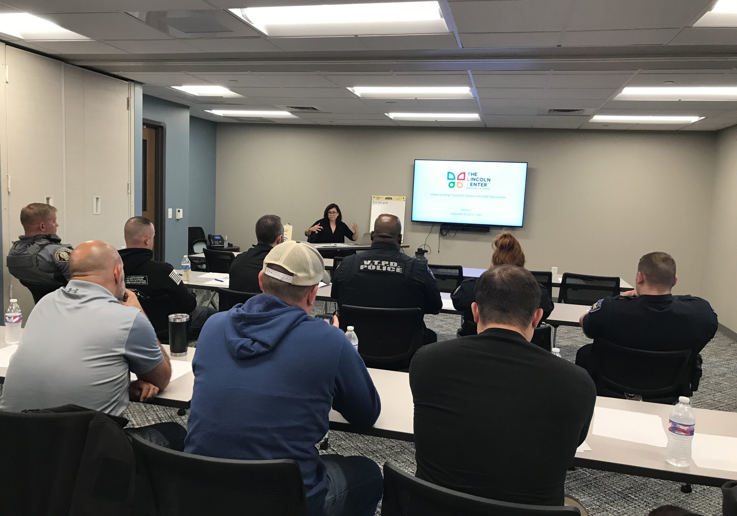 Nicole Seated Training w Officers