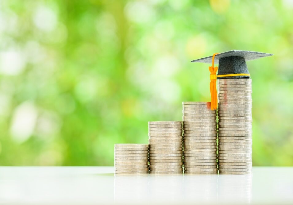 Graduate,Study,Abroad,,Education,Concept,:,Graduation,Cap,Sits,Atop